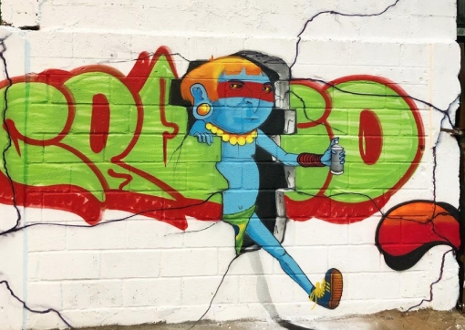 Wat is het verschil tussen graffiti en street art?